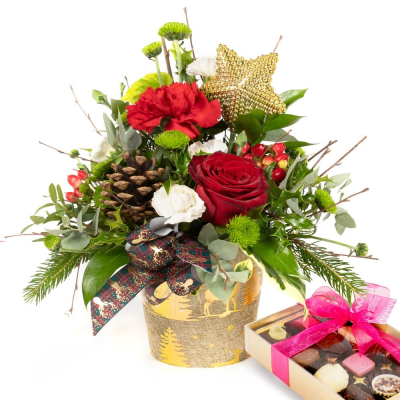 Starlight (With Chocolates) - Show your love this Christmas with this wonderful collection of wintry flowers arranged in a co-ordinating pot.
